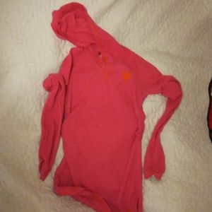 I am selling a large pink Nike hoodie.